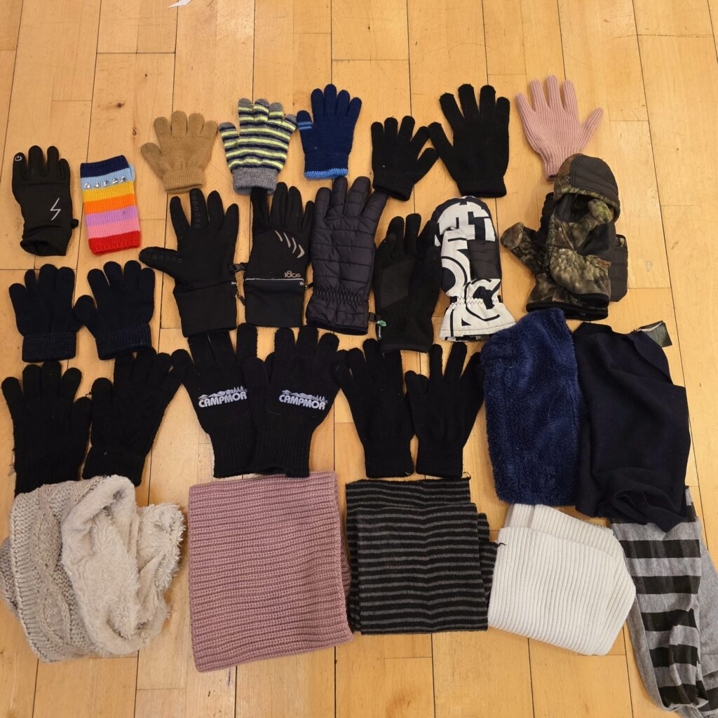 501-Gloves-and-Scarves-in-the-Bin-by-the-Trophy-Case-2-21-Main